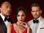 Dwayne Johnson, Gal Gadot dan Ryan Reynolds Bakal Kembali Berkolaborasi di 2 Sekuel Baru “Red Notice”